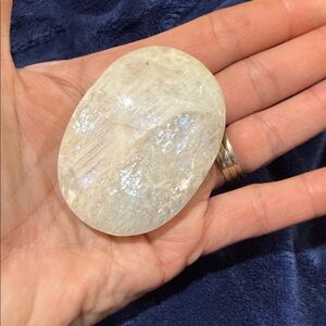 Clear selenite palm stone crystal